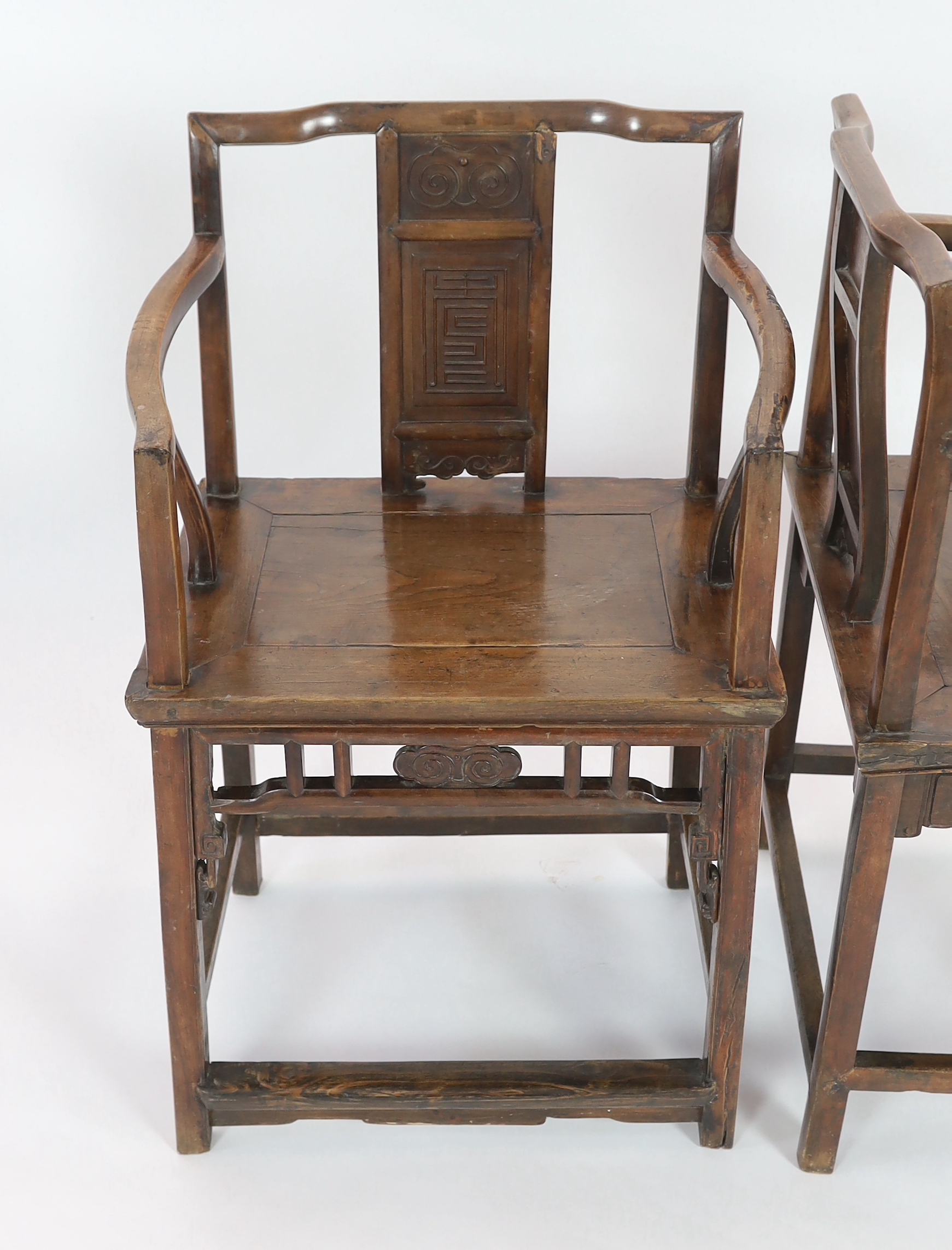 A pair of Chinese walnut armchairs, 19th century